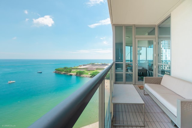 600 N Lake Shore Dr Unit 1905, Chicago, IL 60611 - balcony featuring a water view and an outdoor living space