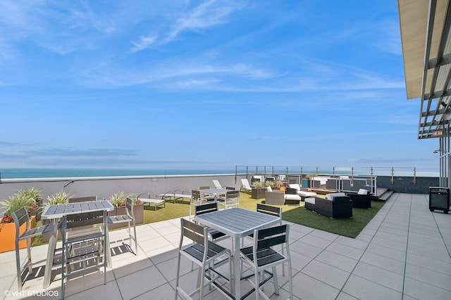 600 N Lake Shore Dr Unit 1905, Chicago, IL 60611 - view of patio with an outdoor hangout area, a water view, and outdoor dining area