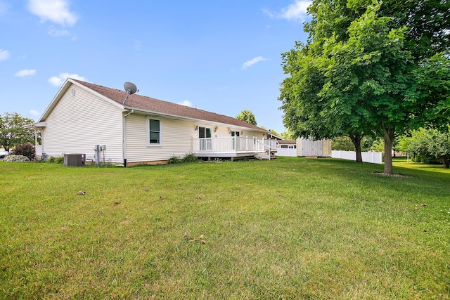 1642 Waterberry Ct, Bourbonnais, IL 60914 - back of house with a wooden deck and a lawn