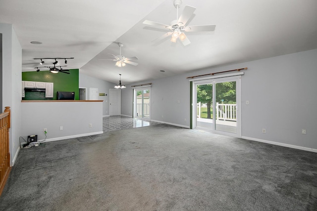 1642 Waterberry Ct, Bourbonnais, IL 60914 - unfurnished living room featuring lofted ceiling, a ceiling fan, carpet floors, and a chandelier