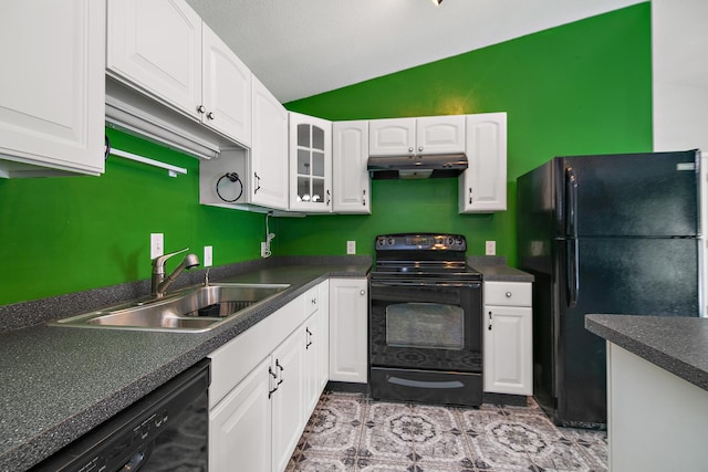 1642 Waterberry Ct, Bourbonnais, IL 60914 - kitchen with black appliances, under cabinet range hood, lofted ceiling, and white cabinetry