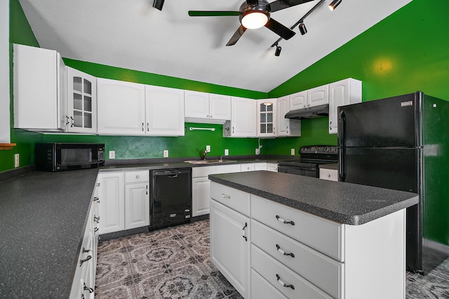 1642 Waterberry Ct, Bourbonnais, IL 60914 - kitchen featuring black appliances, lofted ceiling, under cabinet range hood, dark countertops, and ceiling fan