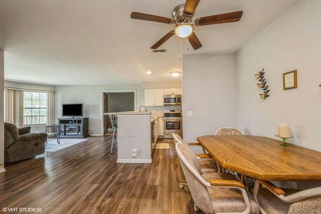 260 W Lynn Dr Unit 7-5B, Palatine, IL 60067 - dining room featuring a ceiling fan and dark wood finished floors