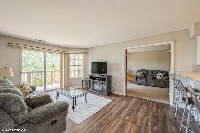 260 W Lynn Dr Unit 7-5B, Palatine, IL 60067 - living room with dark wood-type flooring and baseboards