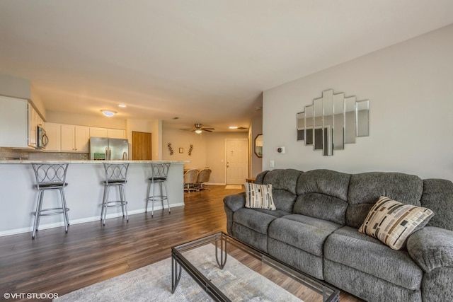 260 W Lynn Dr Unit 7-5B, Palatine, IL 60067 - living room featuring dark wood finished floors and a ceiling fan