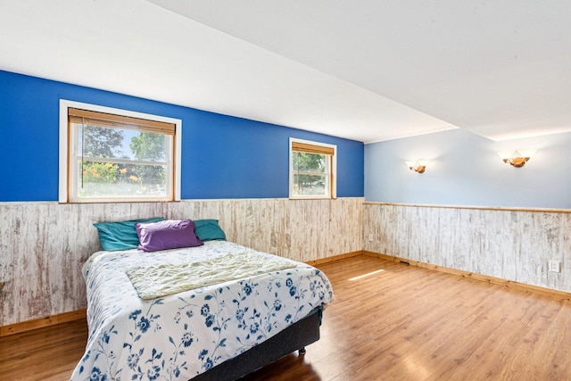 1020 Cassie Dr, Joliet, IL 60435 - bedroom with a wainscoted wall, wood finished floors, and wood walls