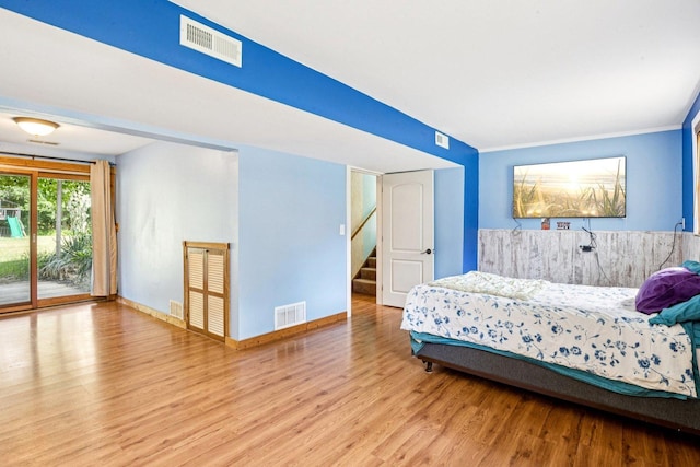 1020 Cassie Dr, Joliet, IL 60435 - bedroom featuring wood finished floors and access to exterior