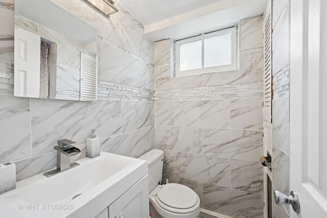 463 N Elm St, Hillside, IL 60162 - bathroom featuring vanity and tile walls