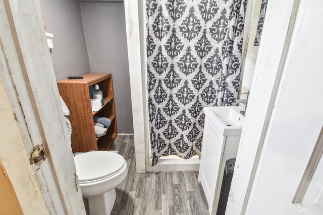 222 W S St, Dwight, IL 60420 - full bathroom with wood finished floors, a stall shower, and vanity