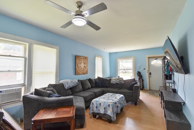 222 W S St, Dwight, IL 60420 - living area featuring light wood-style floors, a ceiling fan, and cooling unit