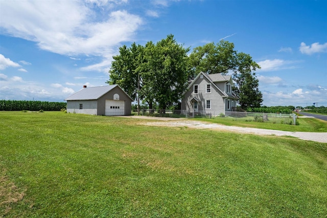 15313 Furrow Rd, Pekin, IL 61554 - view of yard featuring a garage and an outbuilding