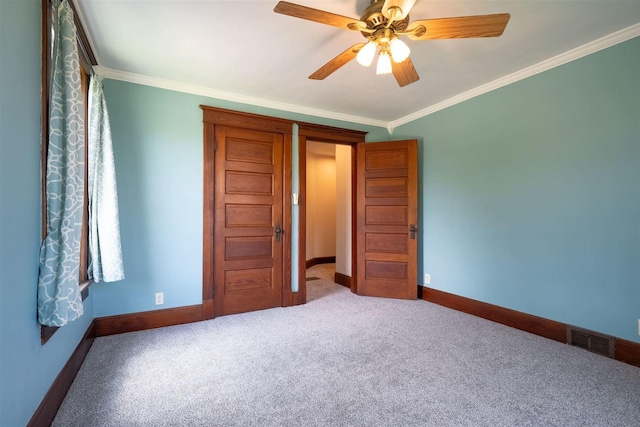 15313 Furrow Rd, Pekin, IL 61554 - unfurnished bedroom featuring ornamental molding, carpet floors, and a ceiling fan