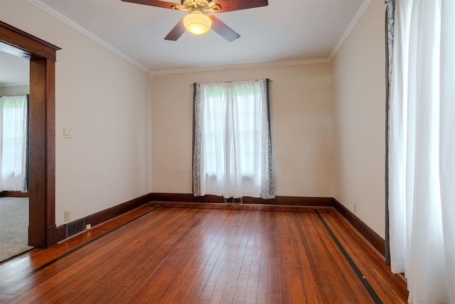 15313 Furrow Rd, Pekin, IL 61554 - spare room featuring wood-type flooring, healthy amount of natural light, ceiling fan, and crown molding