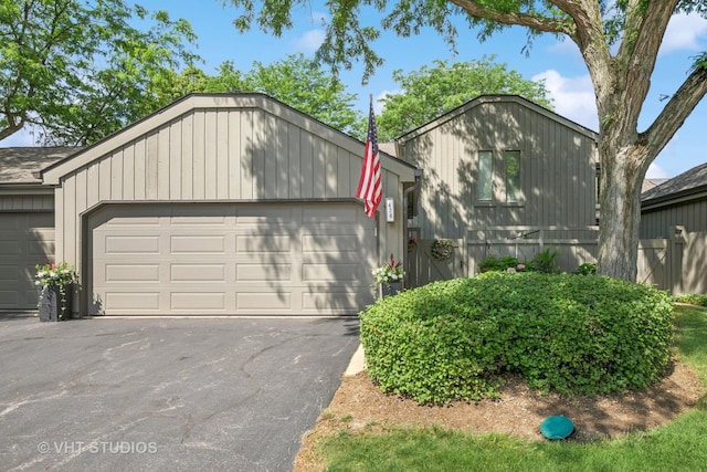 436 Shoreline Rd, Lake Barrington, IL 60010 - view of front facade featuring a garage