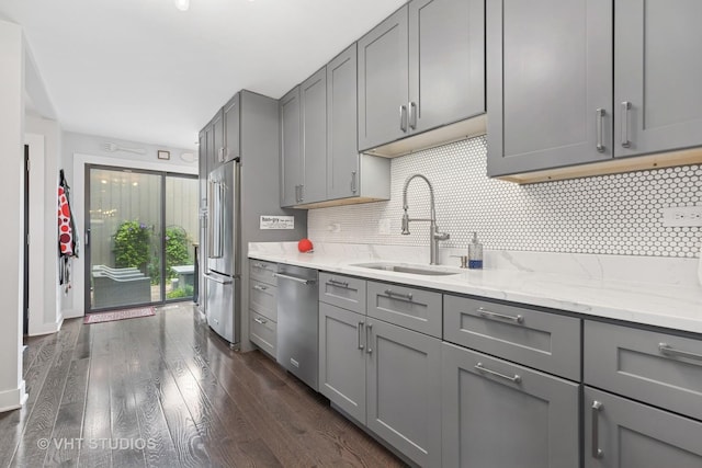 436 Shoreline Rd, Lake Barrington, IL 60010 - kitchen featuring gray cabinetry, stainless steel appliances, dark wood finished floors, and decorative backsplash