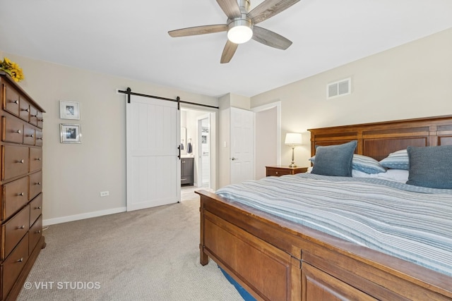 436 Shoreline Rd, Lake Barrington, IL 60010 - bedroom with light colored carpet, a barn door, ensuite bathroom, and ceiling fan