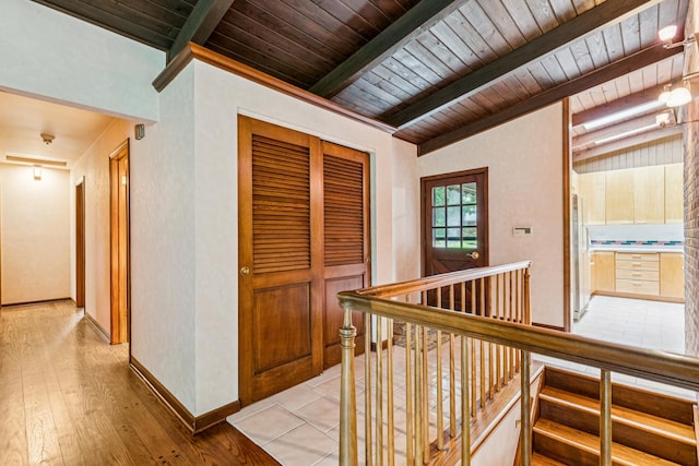 205 Sherwood Rd, Elgin, IL 60120 - hall with wood ceiling, an upstairs landing, and light wood-style flooring