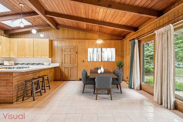 205 Sherwood Rd, Elgin, IL 60120 - dining room with wood walls, a skylight, and wooden ceiling