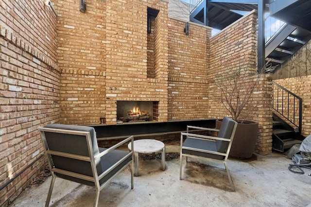 1423 W Huron St Unit 1, Chicago, IL 60642 - view of patio / terrace with an outdoor brick fireplace