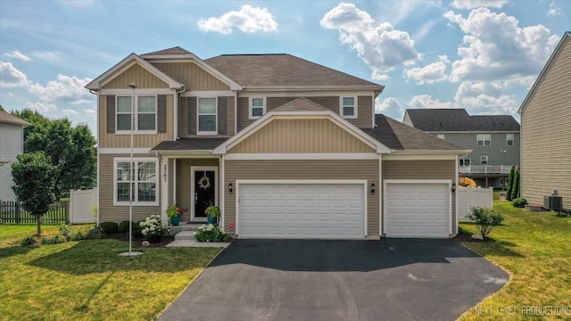 2267 Lundquist Dr, Aurora, IL 60503 - view of front of house featuring driveway and a garage