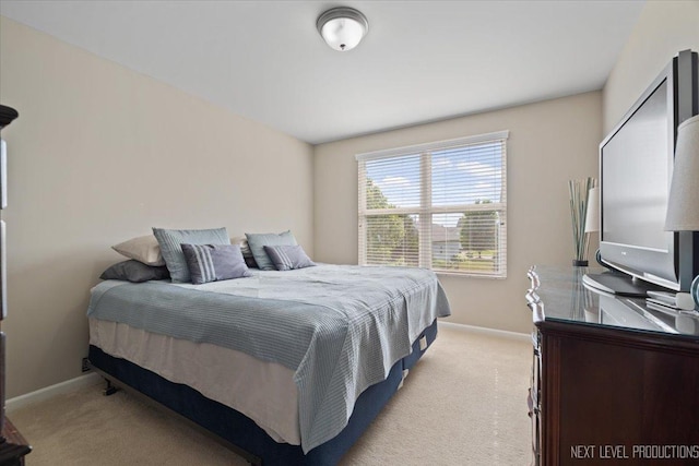 2267 Lundquist Dr, Aurora, IL 60503 - bedroom featuring light carpet and baseboards