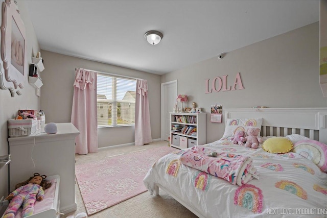 2267 Lundquist Dr, Aurora, IL 60503 - bedroom with carpet flooring and baseboards