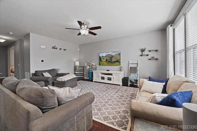 2267 Lundquist Dr, Aurora, IL 60503 - living room with ceiling fan and dark wood-type flooring