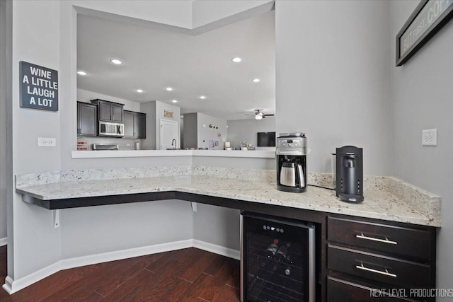 2267 Lundquist Dr, Aurora, IL 60503 - kitchen featuring beverage cooler, stainless steel microwave, dark wood-type flooring, recessed lighting, and a ceiling fan