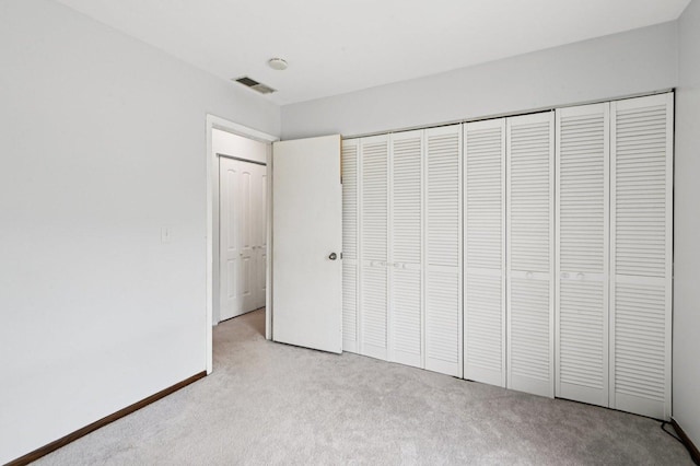 226 Nantucket Hbr Unit 226, Schaumburg, IL 60193 - unfurnished bedroom featuring light carpet and a closet