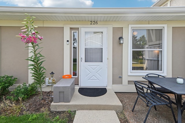 226 Nantucket Hbr Unit 226, Schaumburg, IL 60193 - view of exterior entry featuring stucco siding