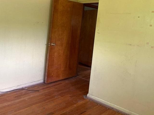 118 National Ave, Danville, IL 61832 - hallway featuring wood finished floors and baseboards