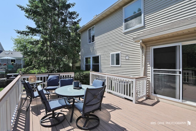 1115 E Fox Chase Dr, Round Lake Beach, IL 60073 - wooden deck featuring outdoor dining space
