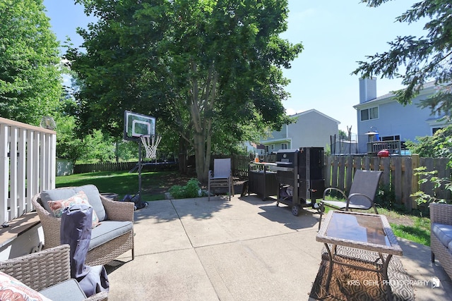 1115 E Fox Chase Dr, Round Lake Beach, IL 60073 - fenced backyard featuring a patio and an outdoor hangout area