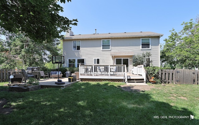 1115 E Fox Chase Dr, Round Lake Beach, IL 60073 - back of house featuring a chimney, a patio area, and a wooden deck