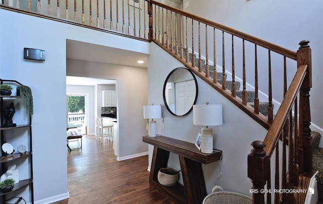 1115 E Fox Chase Dr, Round Lake Beach, IL 60073 - staircase with wood finished floors and baseboards