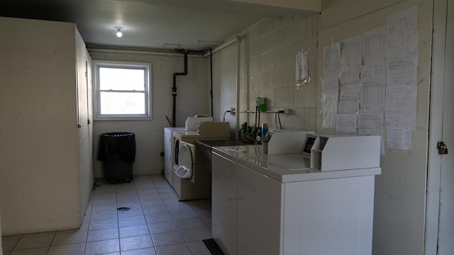 5704 W Montrose Ave Unit 2B, Chicago, IL 60634 - shared laundry room featuring washer and clothes dryer and light tile patterned floors