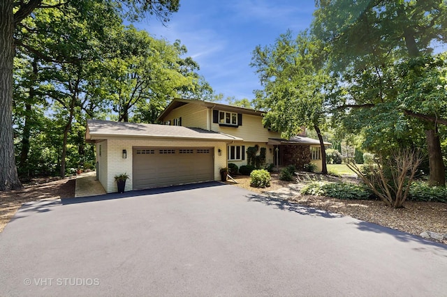 11649 S Walnut Ridge Dr, Palos Park, IL 60464 - traditional-style house featuring a garage, driveway, and brick siding