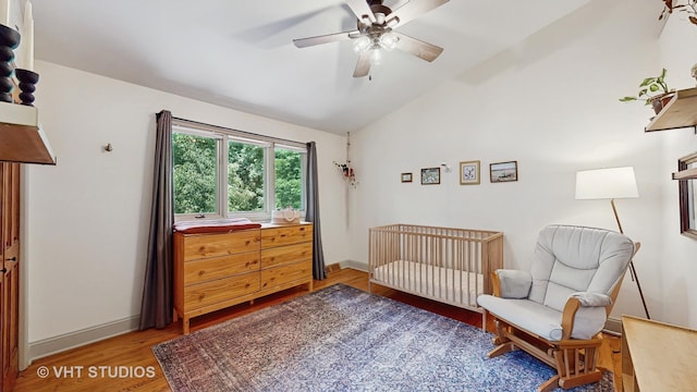11649 S Walnut Ridge Dr, Palos Park, IL 60464 - bedroom featuring wood finished floors, lofted ceiling, a crib, and ceiling fan