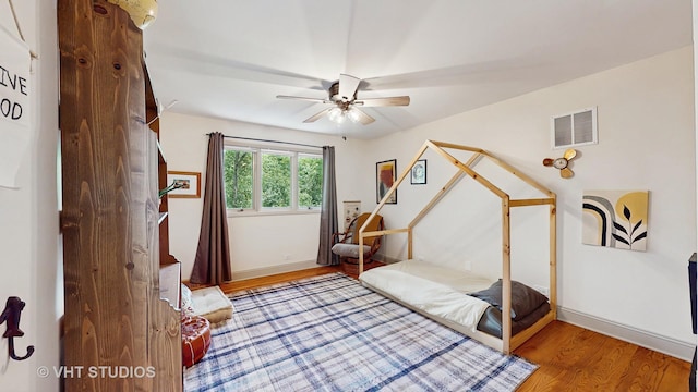 11649 S Walnut Ridge Dr, Palos Park, IL 60464 - bedroom with wood finished floors and a ceiling fan