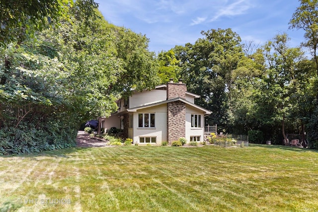 11649 S Walnut Ridge Dr, Palos Park, IL 60464 - rear view of property with a chimney, a lawn, and brick siding