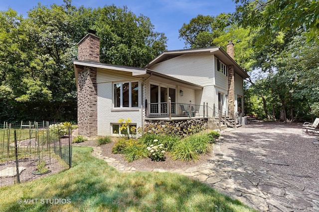 11649 S Walnut Ridge Dr, Palos Park, IL 60464 - view of front facade featuring a chimney, brick siding, and driveway