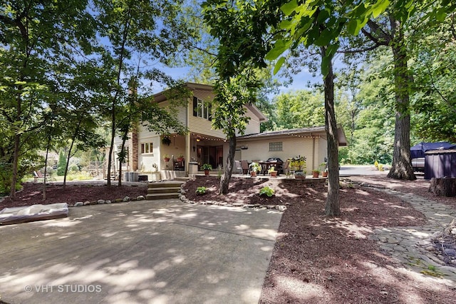 11649 S Walnut Ridge Dr, Palos Park, IL 60464 - view of front facade with a porch and brick siding