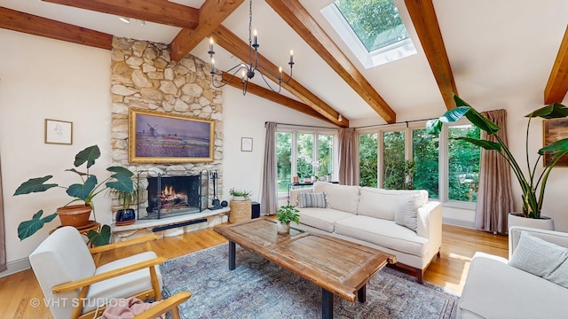 11649 S Walnut Ridge Dr, Palos Park, IL 60464 - living area featuring a skylight, a fireplace, and light wood-style flooring