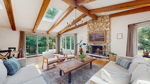 11649 S Walnut Ridge Dr, Palos Park, IL 60464 - living area featuring a skylight, wood finished floors, and a stone fireplace