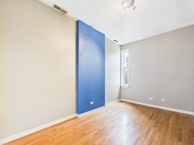 2933 W Wilcox St, Chicago, IL 60612 - spare room with light wood-style floors and baseboards