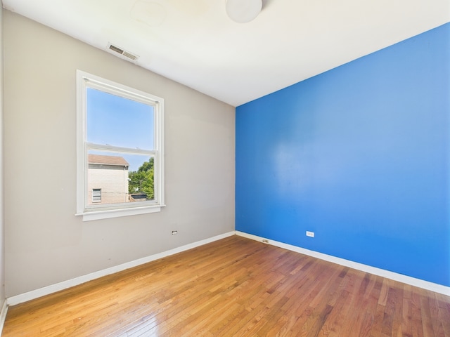 2933 W Wilcox St, Chicago, IL 60612 - spare room with baseboards and light wood-type flooring