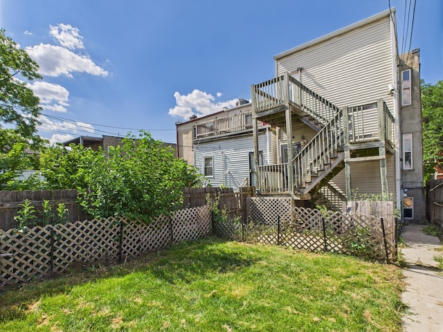 2933 W Wilcox St, Chicago, IL 60612 - back of house featuring stairway and a deck