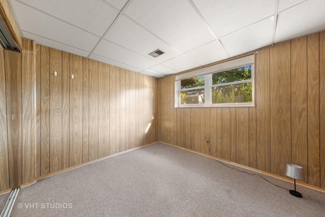2140 Baker St, Aurora, IL 60506 - carpeted spare room featuring wooden walls