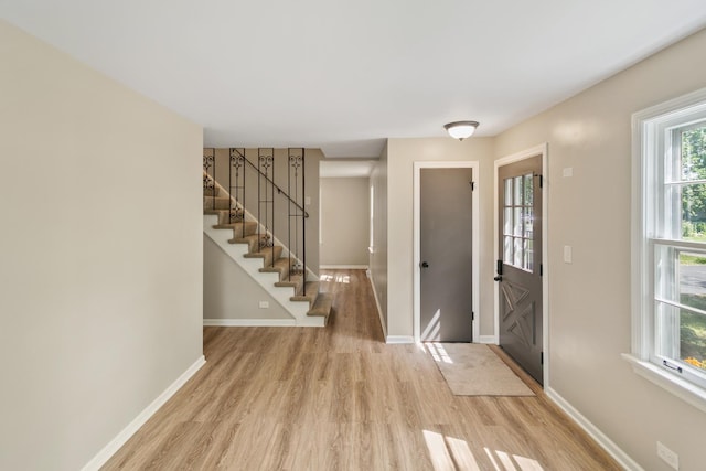 14348 Knox Ave, Midlothian, IL 60445 - entrance foyer with light wood-type flooring and stairs