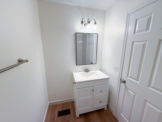 4640 Calvert Dr Unit B1, Rolling Meadows, IL 60008 - bathroom featuring vanity and wood finished floors